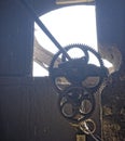 Gears of clock mechanism, Axente Sever Church in Romania Royalty Free Stock Photo