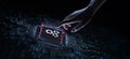 Gears Icon Representing Automation Illustrated on a Processor Touched by a Human Hand