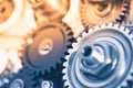 Gears industrial background with warm shiny light Royalty Free Stock Photo