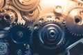 Gears industrial background with warm shiny light Royalty Free Stock Photo