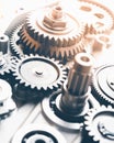 Gears industrial background with warm shiny light Royalty Free Stock Photo