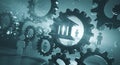 Gears interlock in a futuristic scene, illustrating concepts of connectivity and