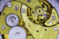 Gears old mechanical watches. Pendulum, cogs under the hood. Royalty Free Stock Photo