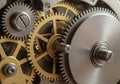 Between the gears suggests movement within a timepiece, emphasizing Royalty Free Stock Photo