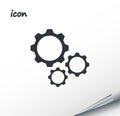 Gears vector icon on a wrapped silver sheet