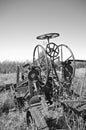 Gears and wheels of an old road grader(black and white) Royalty Free Stock Photo