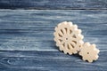 Gears of wood stand on a dark wooden background. Concept of technology and industry, engineering. Mechanical parts, technological Royalty Free Stock Photo