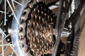 Gearshift on mountain bike MTB, chain moves on rings. Changes speeds. Shift gears on bicycle crank. Work of chain drive Royalty Free Stock Photo