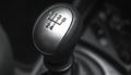 Gearstick transmission inside black interior car, close-up photo Royalty Free Stock Photo