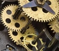 Gearwheels inside clock mechanism.