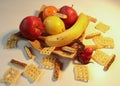 Gecko on food - Still Life - Coleonyx mitratus gecko on fruit arranged on a decorative ceramic plate with salt sticks Royalty Free Stock Photo