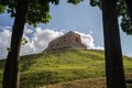 Gediminas Castle Tower on a hill covered in greenery under sunlight in Vilnius in Lithuania Royalty Free Stock Photo