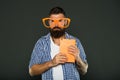 Geek is chic. Study nerd holding book. University male student with lecture notes. Book nerd wearing fancy glasses Royalty Free Stock Photo