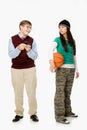 Geek and girl with basketball Royalty Free Stock Photo