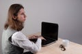 Geek guy is learning new technologies, programming, and computer modeling. Royalty Free Stock Photo