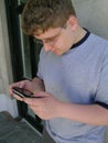 Geek with portable game device