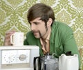 Geek retro man drinking tea coffee vintage teapot Royalty Free Stock Photo