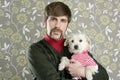 Geek retro man holding dog silly on wallpaper