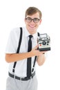 Geeky hipster holding a retro camera