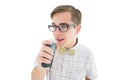 Geeky hipster speaking into dictaphone Royalty Free Stock Photo