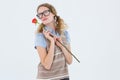 Geeky hipster woman holding rose Royalty Free Stock Photo