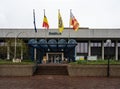 Geel, Flanders, Belgium - Contemporary facade of the city hall with Belgian, European and local flags