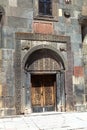 Geghard, a monastery complex, a unique architectural structure in Armenia, a beautiful ancient door with patterns to the temple Royalty Free Stock Photo
