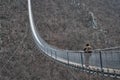 Geierlay suspension bridge over deep valley in Germany Royalty Free Stock Photo