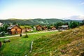 GEILO, NORWAY: Old traditional framehouses with grass on the roof in the middle of valley, Geilo, Norway