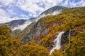 Geiranger fjord. magnificent waterfall at sunset in Norway