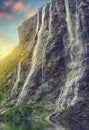 Geiranger fjord. magnificent waterfall at sunset in Norway