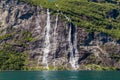 Geiranger fjord, Norway: landscape with mountains and waterfalls at summertime. Norway nature and travel background. Camera hovers Royalty Free Stock Photo