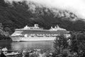 Geiranger, Norway - January 25, 2010: cruise ship in norwegian fjord. Travel destination, tourism. Adventure, discovery Royalty Free Stock Photo