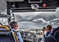 A driver steers his coach through the mountains in Norway