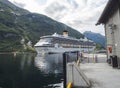 Geiranger, Norway, September 7, 2019: View on Cruise liner ship Costa Pacifica moored at the port at Geiranger tourist Royalty Free Stock Photo