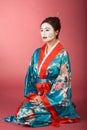 Geisha Japanese woman in kimono and facepaint Royalty Free Stock Photo