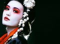 Geisha in kimono on black Royalty Free Stock Photo