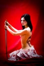 Geisha with sword and tattoo Royalty Free Stock Photo