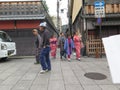 Geishas family walking through Gion district, Kyoto