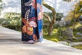 Geishas girl wearing Japanese kimono among red wooden Tori Gate at Fushimi Inari Shrine in Kyoto, Kimono is a Japanese traditional Royalty Free Stock Photo