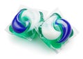 Gel capsule pods with laundry detergent on white Royalty Free Stock Photo