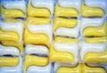 Gel capsules with laundry detergent, close up. Royalty Free Stock Photo