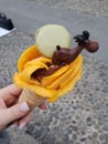 Gelato ice cream at amorino gelateria with chocolate reindeer for Christmas winter in navigli milan milano italia italy