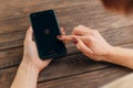 Gelendzhik, Russia, 20 February 2020: Woman uses iPhone 11 for social media.