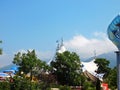 Gelendzhik, Russia - June 29, 2018: The Gold Bay aqua park. 2 tops of the tent with flags