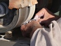 Gem cutter grinds a stone, fast rotating grindstones Royalty Free Stock Photo