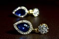 Gem and Jewelry Is a diamond earring Blue gemstone Beautiful and glossy It is a luxurious