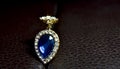 Gem and Jewelry Is a diamond earring Blue gemstone Beautiful and glossy It is a luxurious and expensive