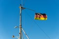 Geman flag on mast or pole of a boat Royalty Free Stock Photo