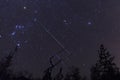 Geminid meteor over ham radio satellite antenna